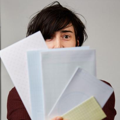 Photo of Gloria González Fuster with papers